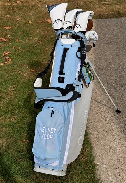 Kelsey's custom engraved Callaway bag and new set of clubs.